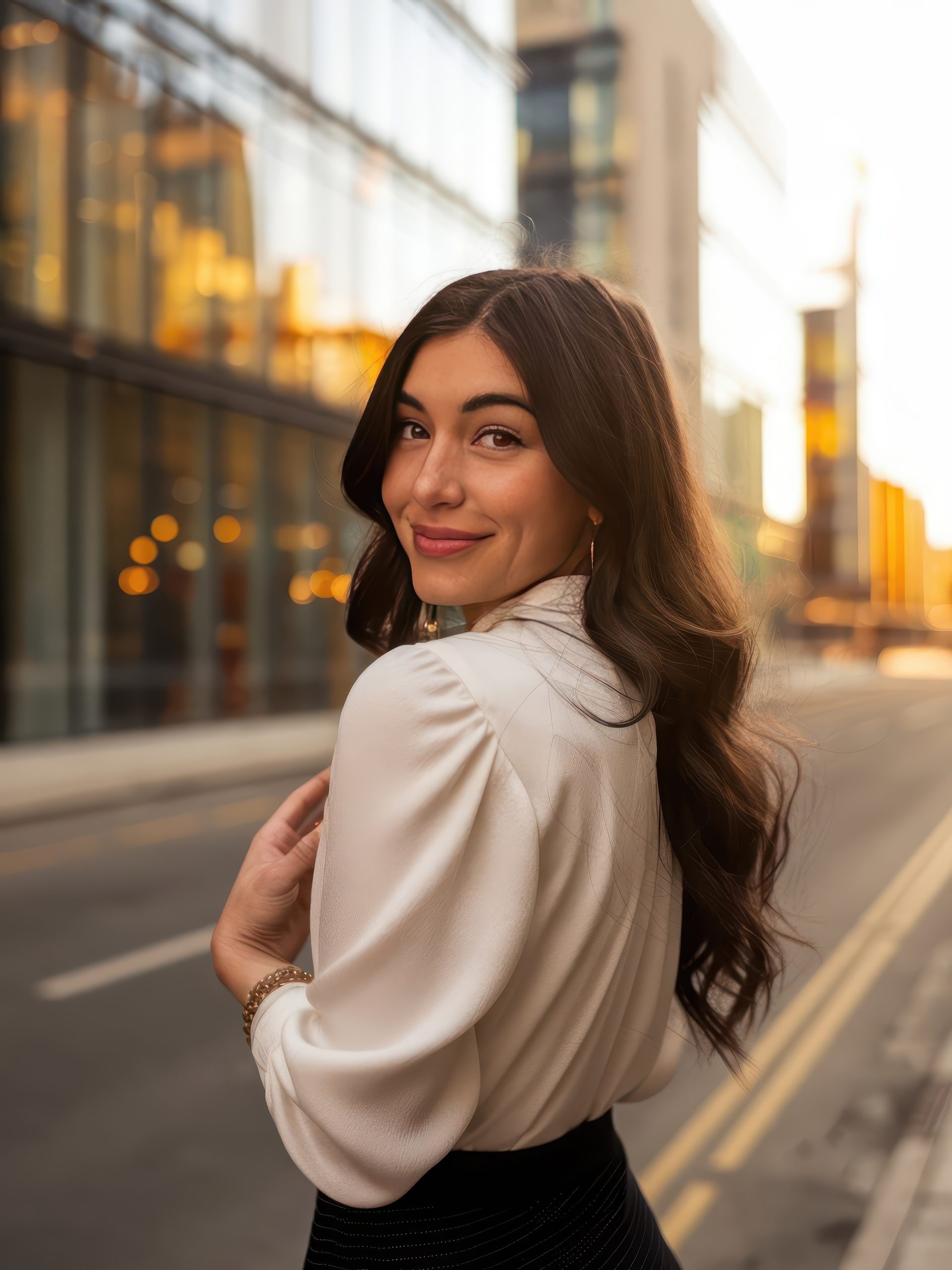 a-brunette-girl-woman-modeling-posing-on-the-street-in-office-style-dress